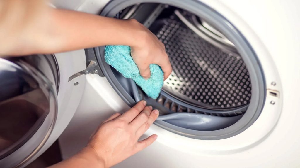 como limpar lava e seca borracha Limpeza da borracha da lavadora de roupas.