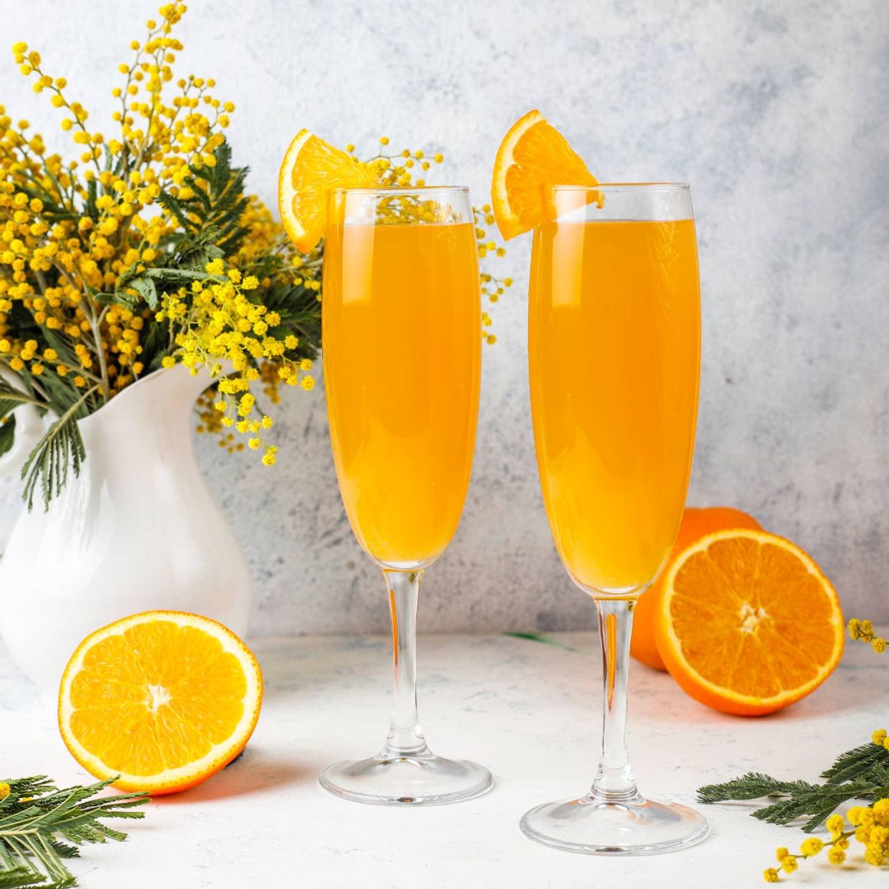 caseiros refrescantes coqueteis de mimosa laranja com champaigne 