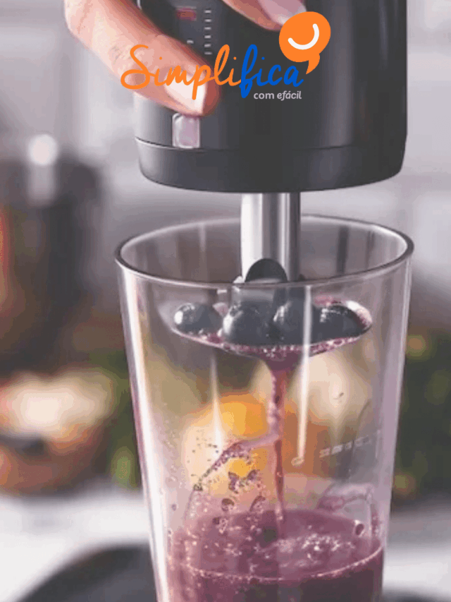 Preparing smoothie with berries in a blender